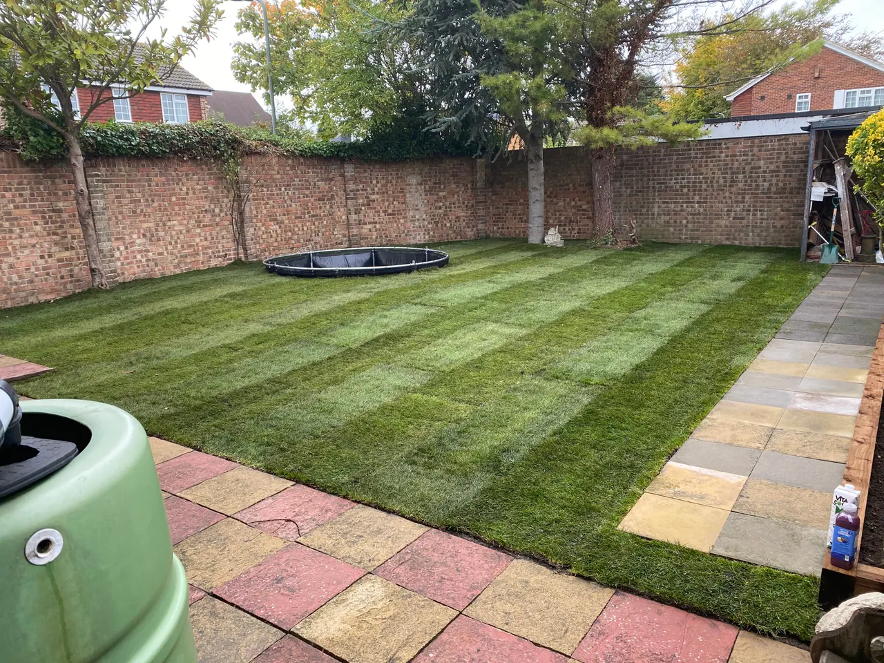 Tidy lawn and planting after a clearance