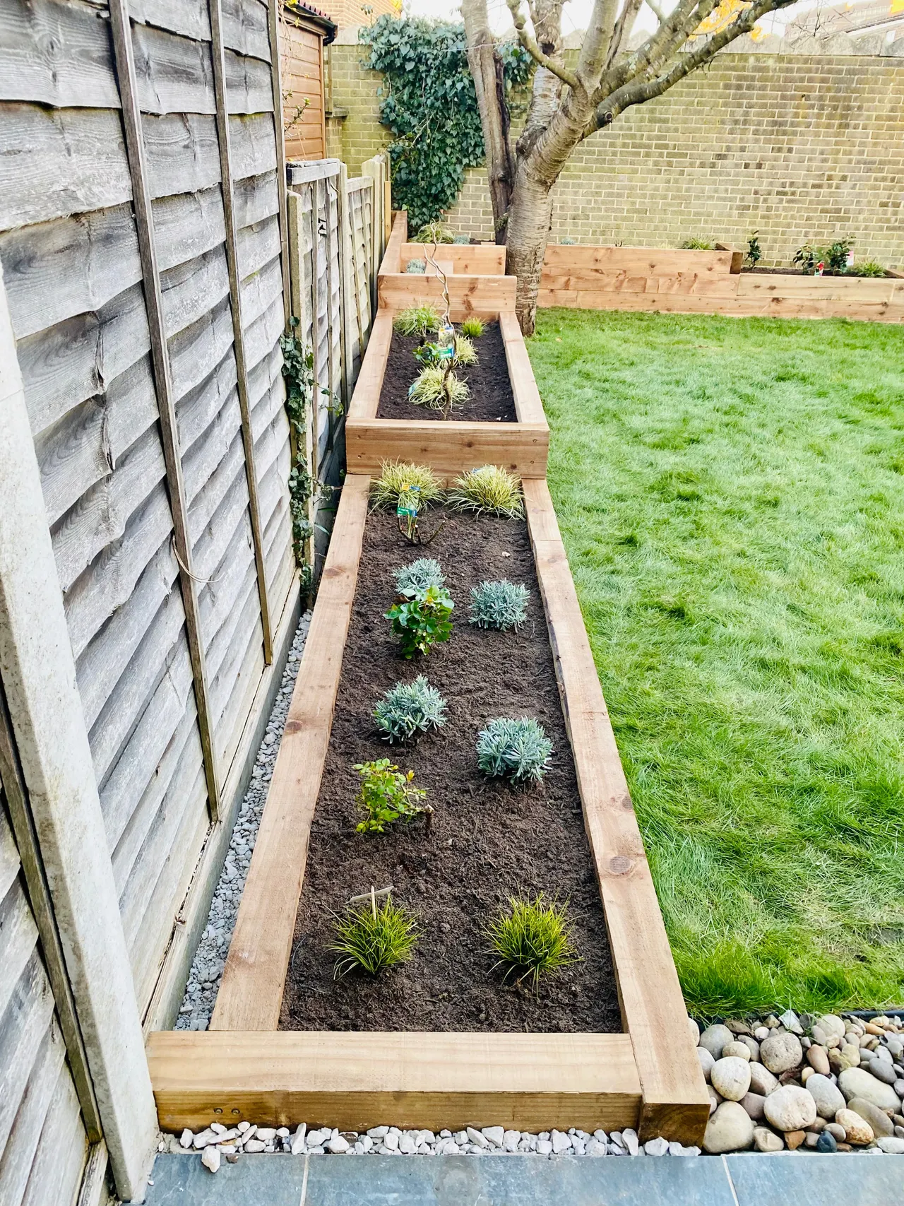 Sleeper raised beds with fresh planting